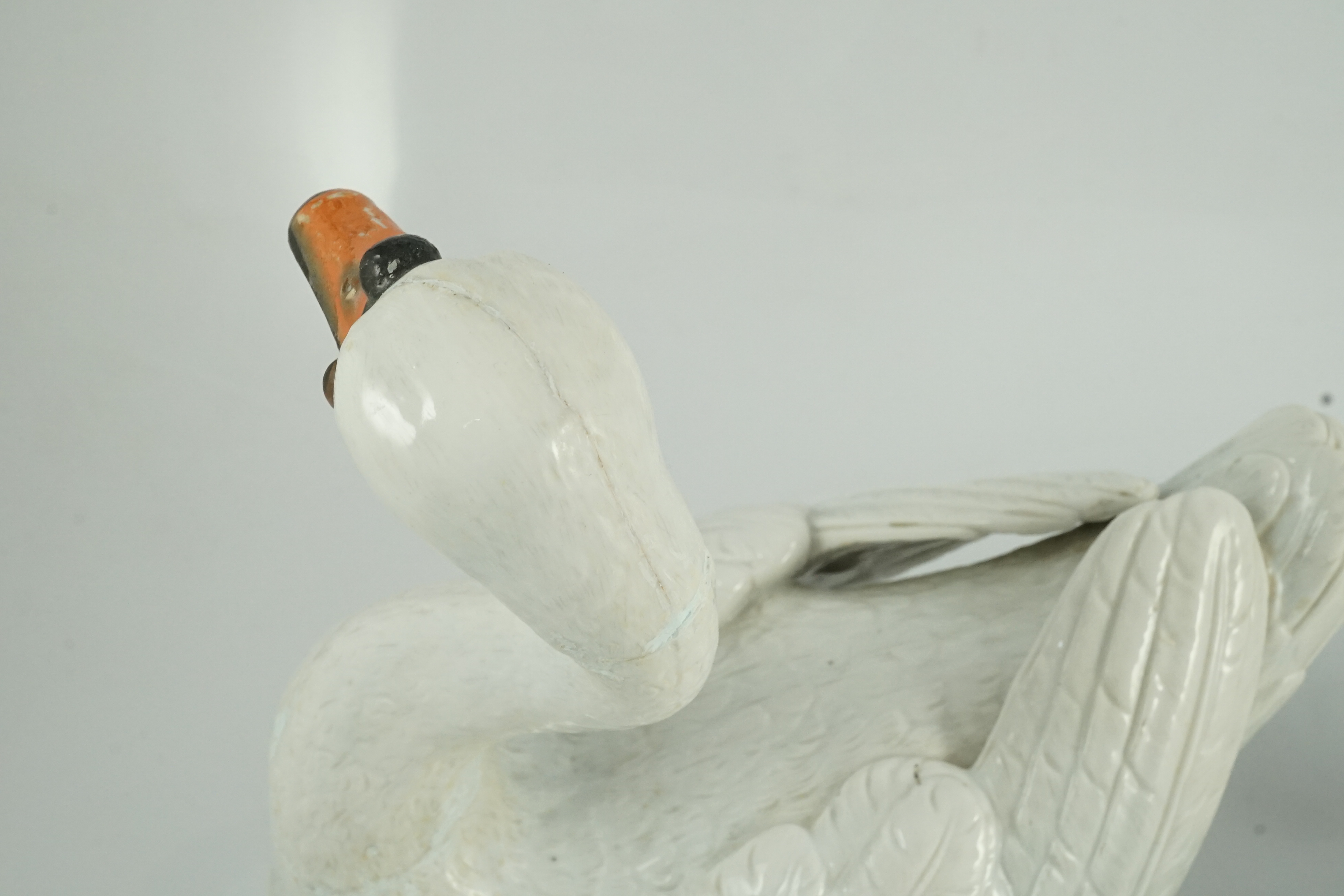 A pair of large Meissen models of swans, 19th century, one neck restored